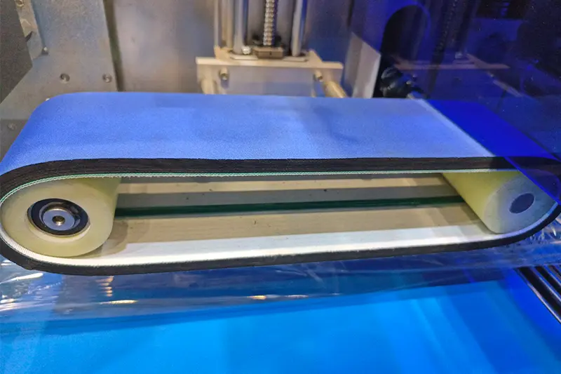 What materials are conveyor belts made of?